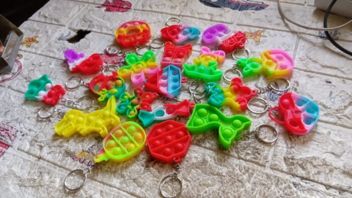 Compact Silicone Pop it Keychain Toy - Birthday Return Gift of Kids - Portable Bubble Popping Fun Stress Relief Fidget Toy (mix design | 1 Pc) - Image 8