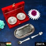 Brass tray set with two bowls and spoons.